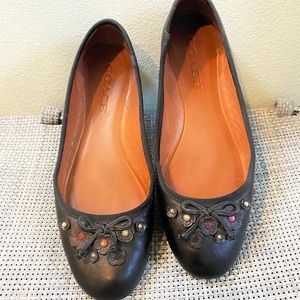 Leather flats by Coach